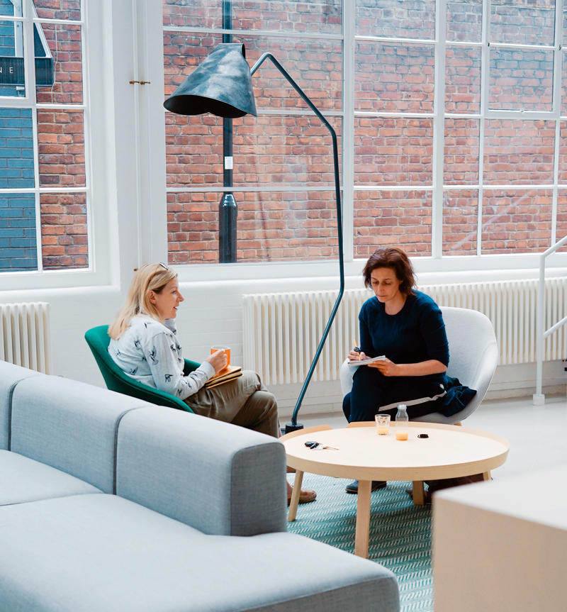 Supervision Supervision with two people in relaxed setting talking